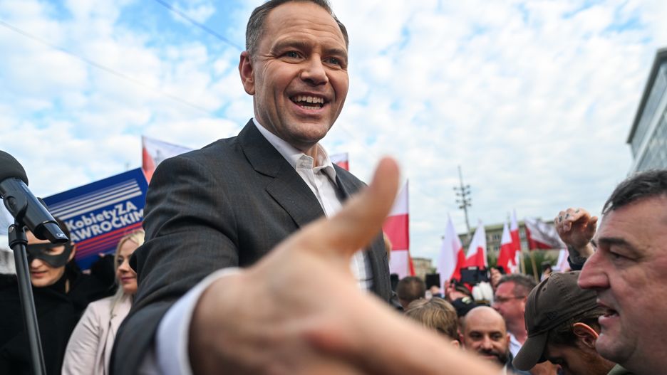 KATOWICE, POLAND - MAY 29: Karol Nawrocki, a non-partisan Presidential candidate supported by the Law and Justice Party, greets supporters during a political rally as the Presidential campaign enters the last days ahead of the runoff on May 29, 2025 in Katowice, Poland. Polish Presidential frontrunner Karol Nawrocki is holding a rally in the southern city of Katowice, ahead of a June 1 runoff. Nawrocki, representing the Law and Justice Party (PiS), received 29.5 percent of the first round vote on May 18, while his opponent Rafał Trzaskowski, the liberal mayor of Warsaw, garnered 31.4 percent of the ballot. The election is seen as a test of whether the government, with its centrist parliamentary coalition, can overcome the right-wing populism embodied by PiS, which has held the presidency since 2015.  (Photo by Omar Marques/Getty Images)