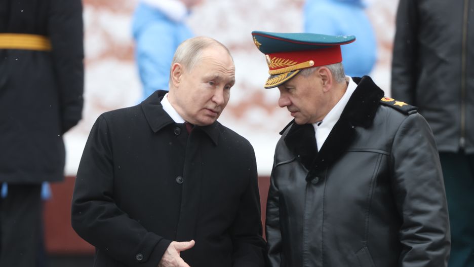 MOSCOW, RUSSIA - FEBRUARY 23:  (RUSSIA OUT) Russian President Vladimir Putin (L) listens to Defence Minister Sergei Shoigu (R) while taking part in the wreath laying ceremony at the Unknown Soldier Tomb, marking the Defender of the Fatherland's Day, on February 23, 2024, in Moscow, Russia. Putin is candidate for the 2024 Presidential Elections. (Photo by Contributor/Getty Images)