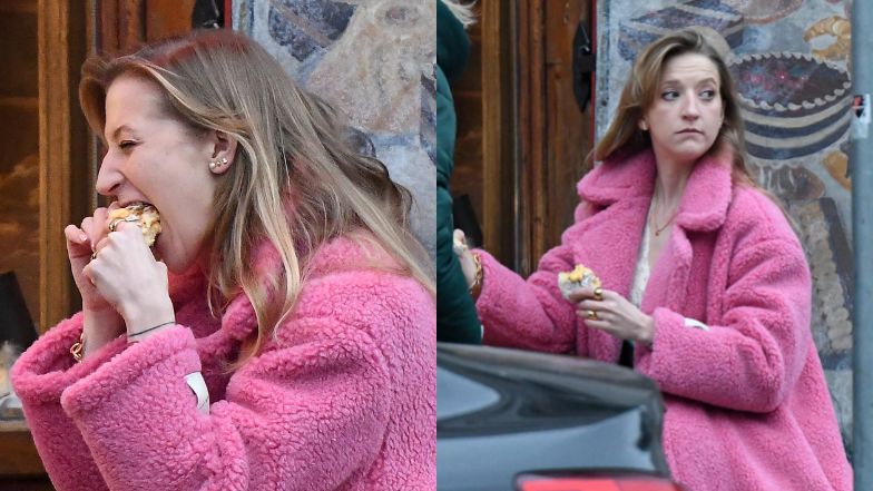 Lara Gessler zajada się pączkiem na ulicy 