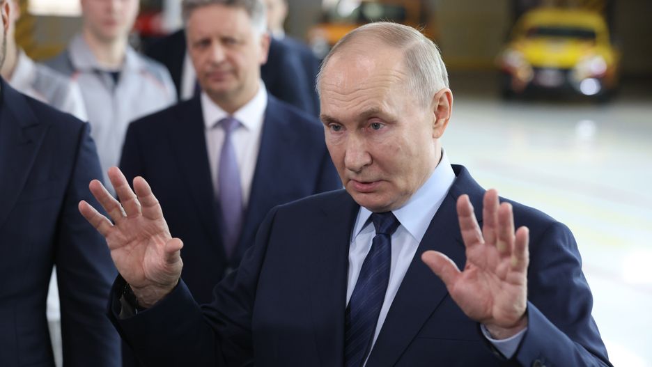 TOGLATTI, RUSSIA - JANUARY 28 (RUSSIA OUT) Russian President Vladimir Putin (C) gestures during his meeting with workers, while visiting the AvtoVAZ automobile plant, January 28, 2025, in Togliatti, Russia. Putin is having a one-day trip to Samara Oblast region and visited the largest Russia's car manufacturer AvtoVAZ (Lada), owned by the state. (Photo by Contributor/Getty Images)
