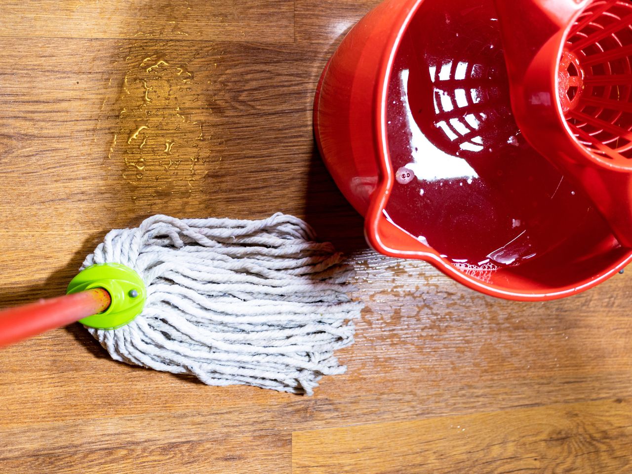 Put it in the bucket and wash the floor. Cleaning companies keep it on secret