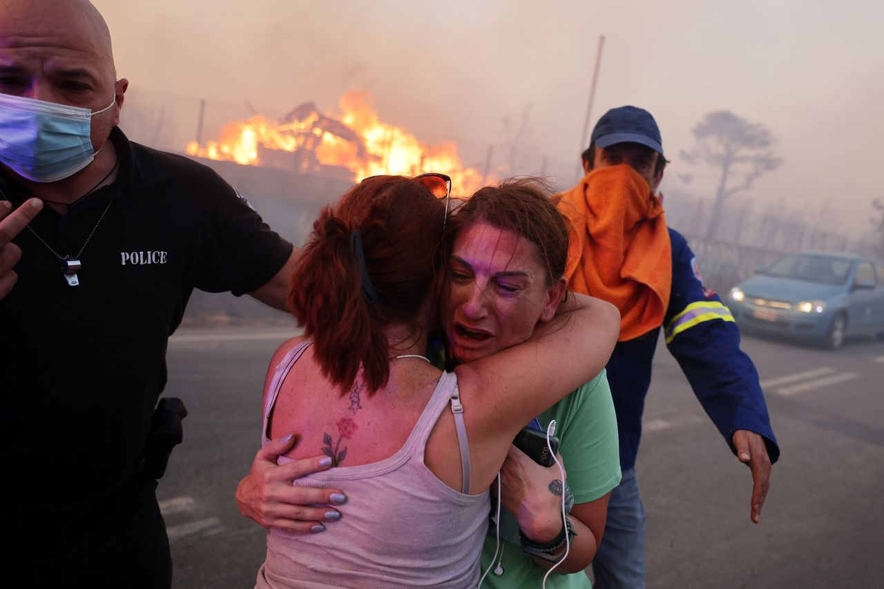 Greek wildfires spread as firefighters battle flames near Athens