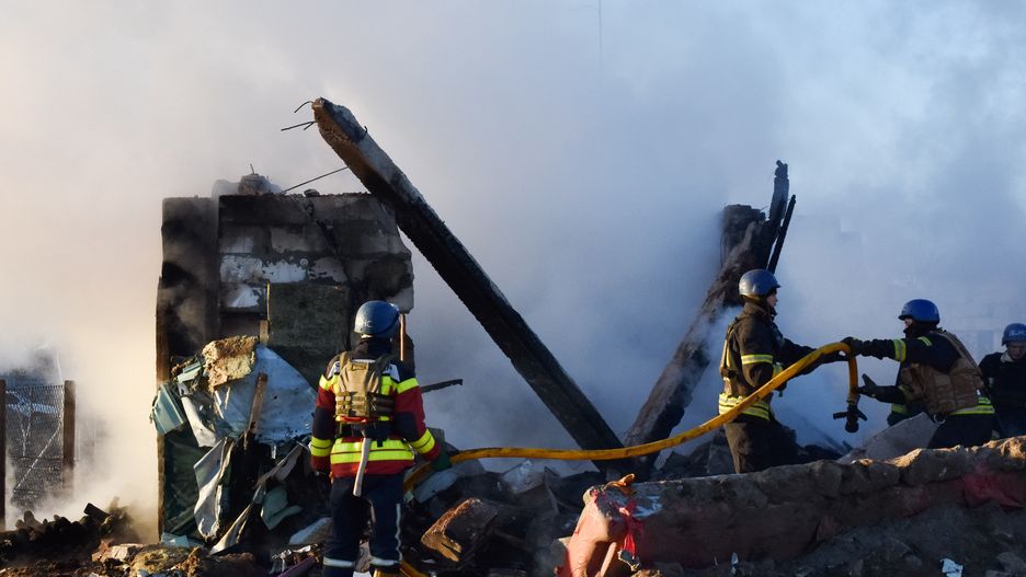 ZAPORIZHZHIA, UKRAINE - 2023/03/31: Ukrainian State Emergency Service firefighters put out the fire after the Russian shelling hit suburban area in Zaporizhzhia. On the night of March 31, the Russian occupying army shelled Zaporizhzhia with MLRS (Multiple Launch Rocket System). As the Ukrainian News Agency earlier reported, in addition, during the night, the aggressor country, the Russian Federation, launched 10 Shahed attack drones over Ukraine, 9 of which were destroyed by the air defense forces. (Photo by Andriy Andriyenko/SOPA Images/LightRocket via Getty Images)