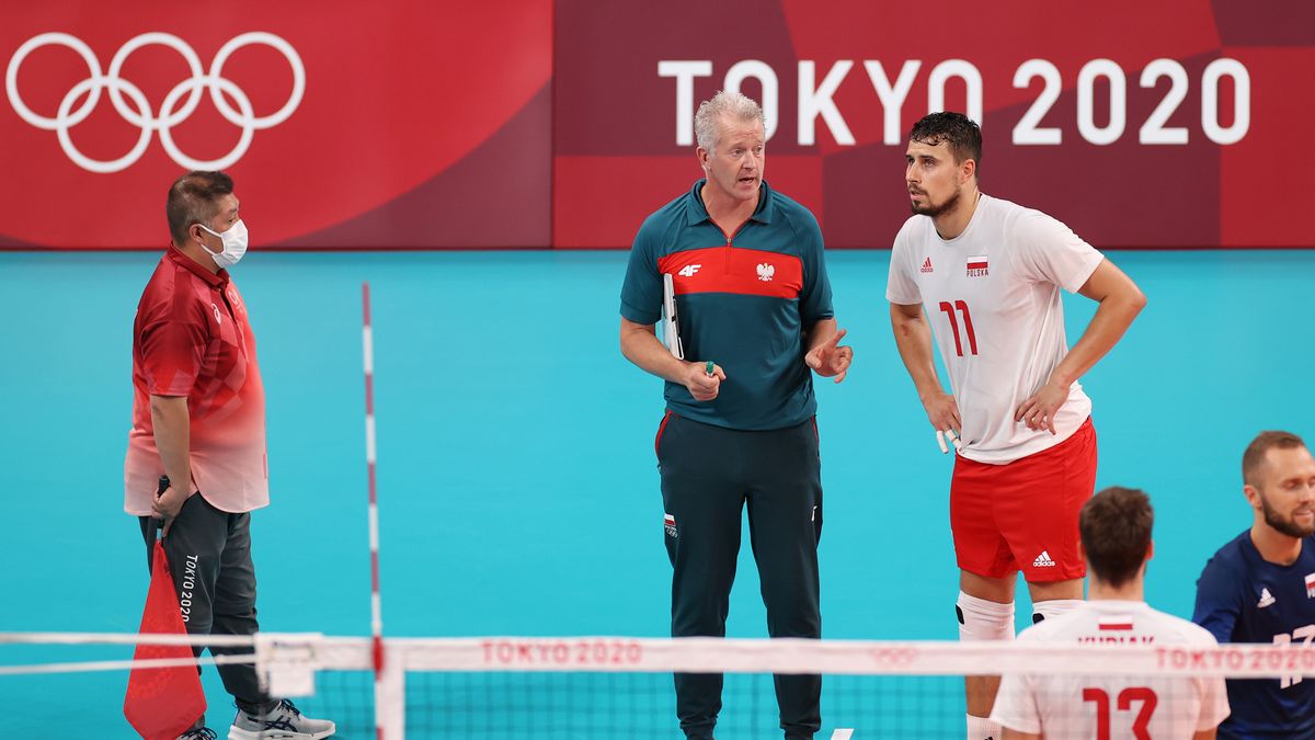 TOKYO, JAPAN - JULY 28: Vital Heynen of Team Poland speaks with Fabian Drzyzga #11 against Team Venezuela during the Men's Preliminary Round - Pool A volleyball on day five of the Tokyo 2020 Olympic Games at Ariake Arena on July 28, 2021 in Tokyo, Japan. (Photo by Toru Hanai/Getty Images)