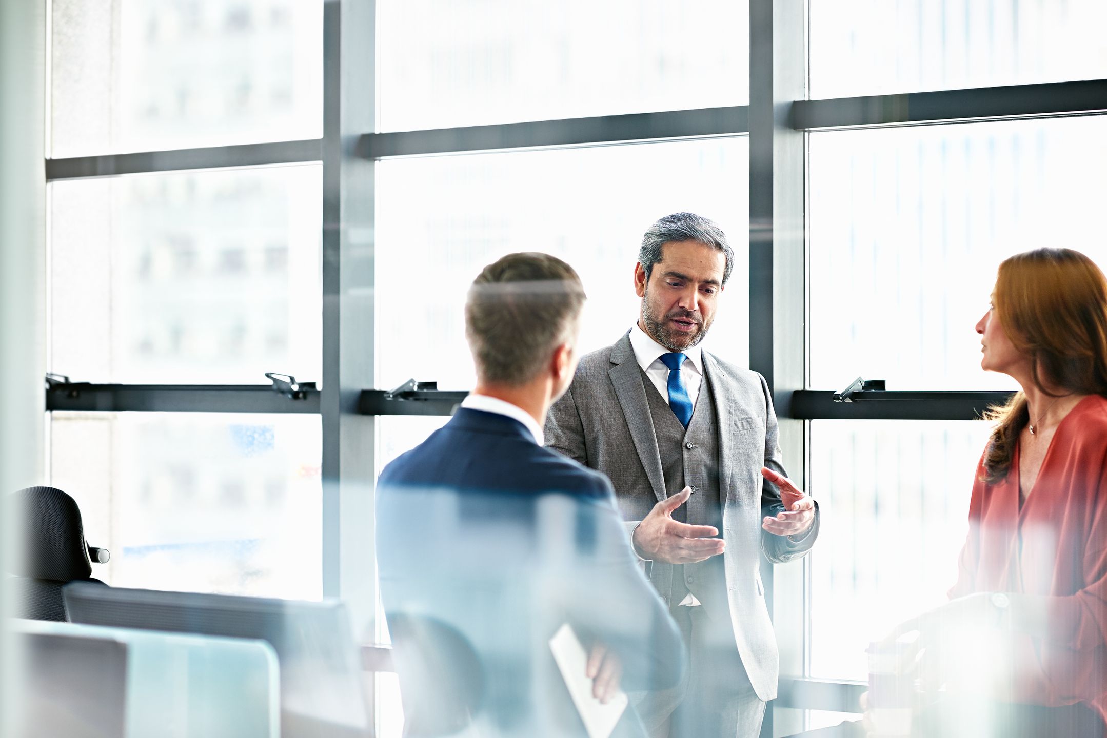 Business people discussing plans in modern office10'000 HoursCorporate business, meeting, Leadership, office, Business