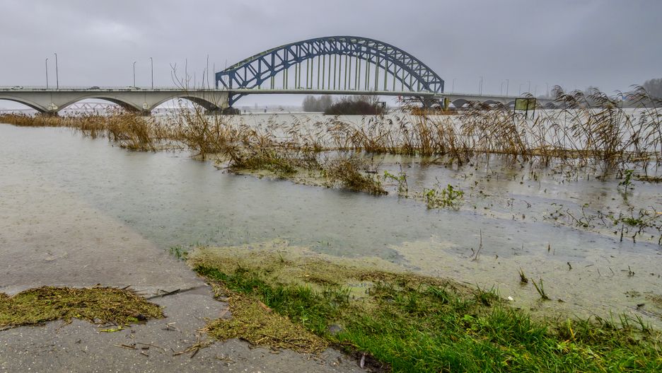 ZWOLLE, NETHERLANDS - DECEMBER 22: Oude IJsselbrug over the IJssel river with high water level on the floodplains of the river IJssel after a long period of heavy rain upstream on December 22, 2023 in Zwolle, The Netherlands. (Photo by Sjoerd van der Wal/Getty Images)