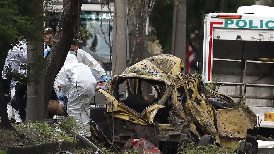 Attack near military school in Cali
epa12315745 Members of the Criminal Investigation and Interpol Directorate (DIJIN) inspect a damaged vehicle near the Marco Fidel Suarez Military Aviation School in Cali, Colombia, 21 August 2025, after an attack.  EPA/Ernesto Guzman 
Dostawca: PAP/EPA.
Ernesto Guzman
Attack, Airbase, Police, Army
