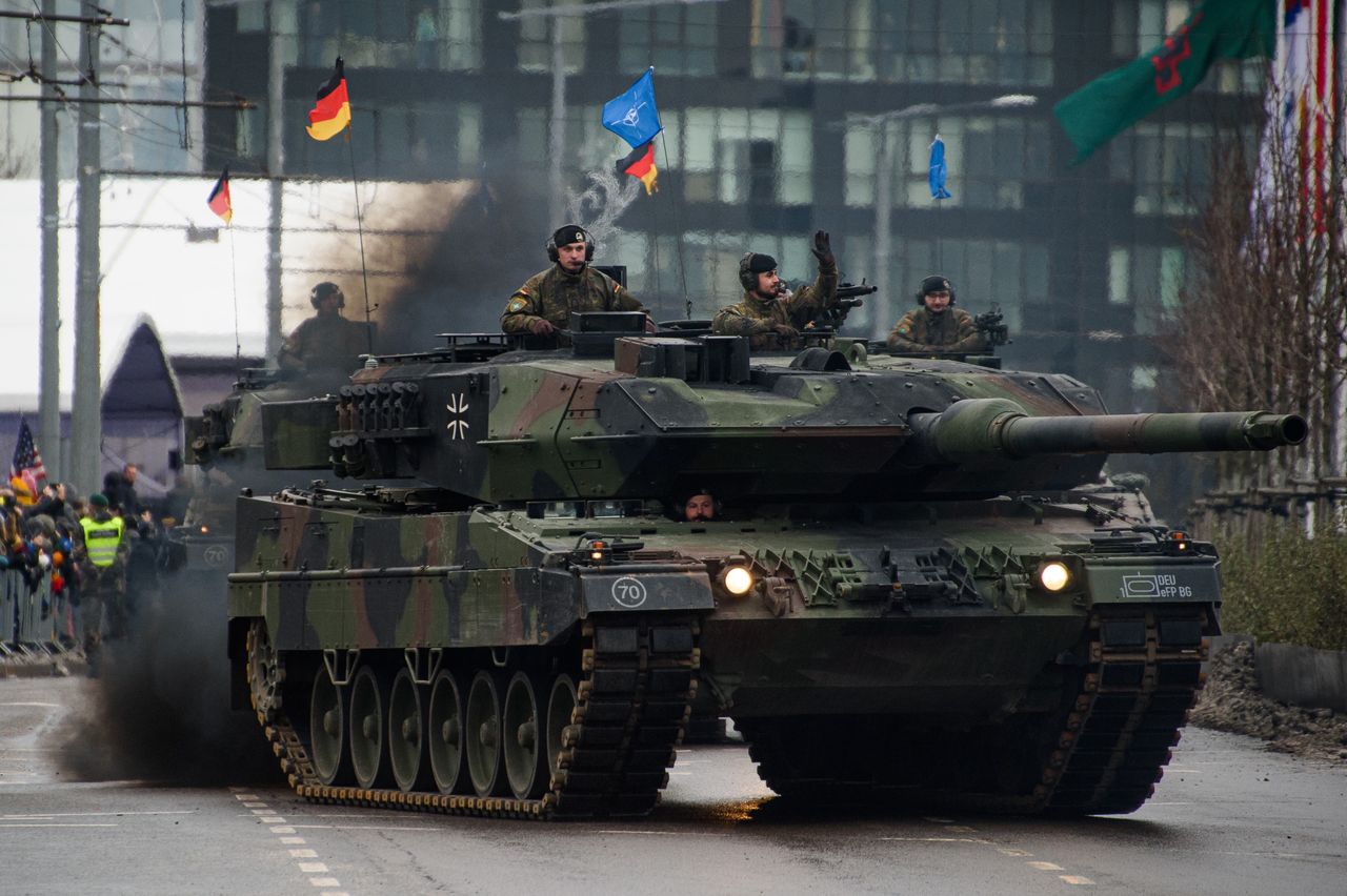 VILNIUS, LITHUANIA - 2023/11/25: German army main battle tanks Leopard 2A6 take part in a military parade during Armed Forces Day in Vilnius. Armed Forces Day honours the restoration of the Lithuania armed forces on November 23, 1918. The military parade commemorating the holiday is being held this year on November 25 in Vilnius. Both Lithuanian military and allies from NATO countries took part in the parade, totaling about 1,400 people and 100 pieces of military equipment. (Photo by Yauhen Yerchak/SOPA Images/LightRocket via Getty Images)