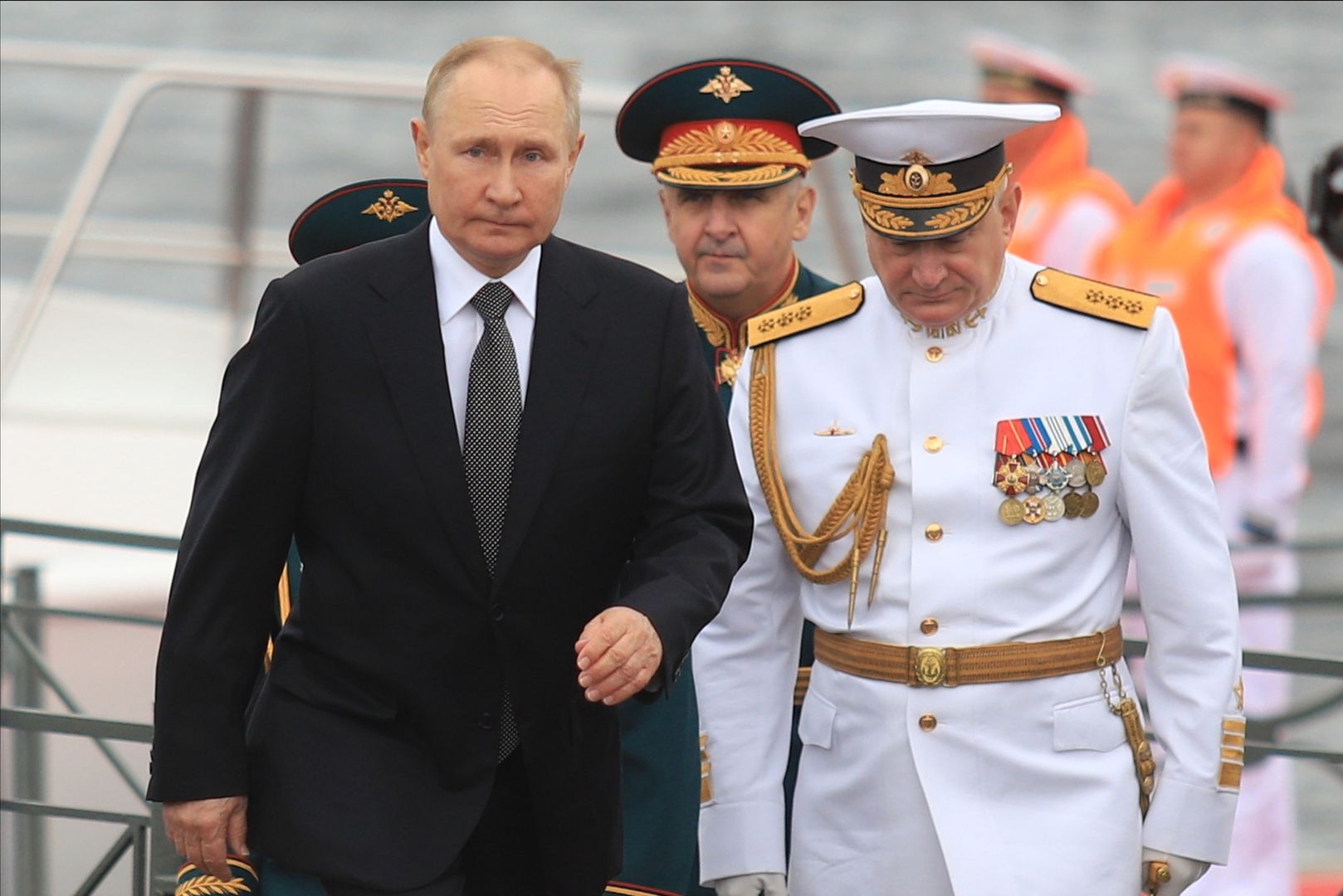 SAINT-PETERSBURG, RUSSIA - JULY 31: Russian President Vladimir Putin (L) and commander-in-chief of the Russian Navy Nikolai Yevmenov (R) attend Navy parade marking Russian Navy Day in St. Petersburg, Russia on July 31, 2022. (Photo by Stringer/Anadolu Agency via Getty Images)