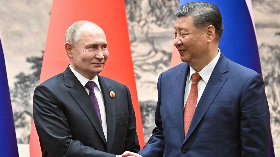 Temporary
TOPSHOT - In this pool photograph distributed by the Russian state agency Sputnik, Russia's President Vladimir Putin and China's President Xi Jinping shake hands during a signing ceremony following their talks in Beijing on May 16, 2024. (Photo by Sergei BOBYLYOV / POOL / AFP) / ** Editor's note : this image is distributed by Russian state owned agency Sputnik **
SERGEI BOBYLYOV
