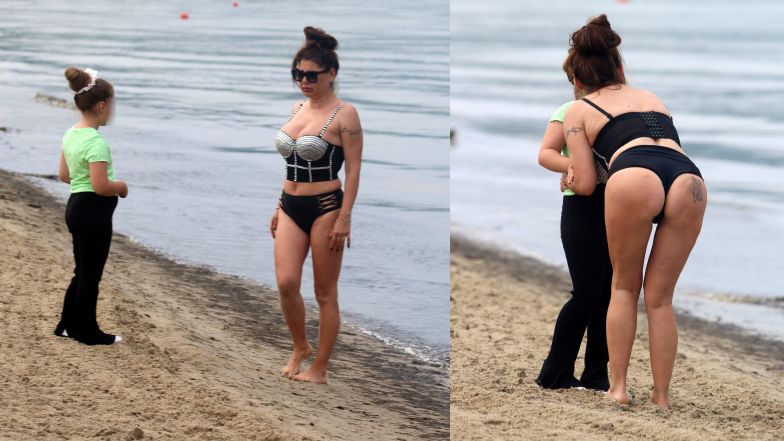 Roznegliżowana Iwona Węgrowska pręży się na plaży w towarzystwie córki
