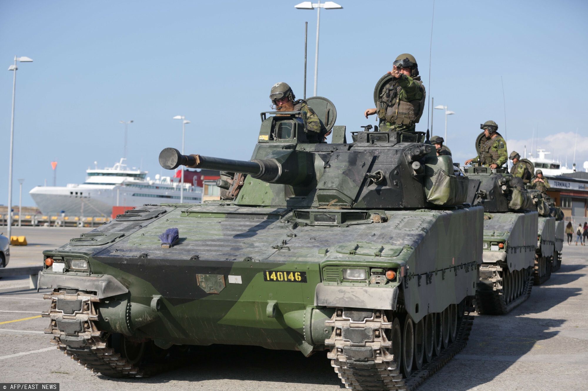 arch25
This picture taken on September 14, 2016 shows Swedish military armored vehicles in the harbour of Visby, on the Gotland island in Sweden.  Sweden announced Thursday, March 2, 2017 that it will reintroduce compulsory military service starting this summer to respond to global security challenges including from Russia.  / AFP PHOTO / TT News Agency / SOREN ANDERSSON / Sweden OUT
SOREN ANDERSSON