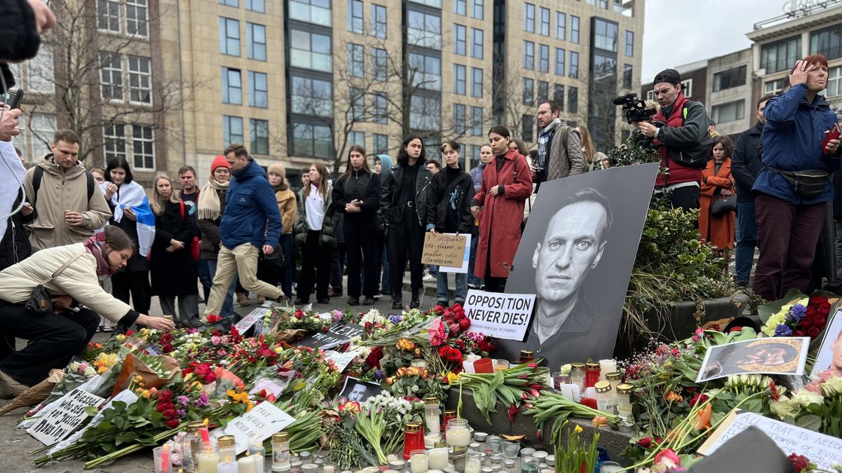 AMSTERDAM, NETHERLANDS - FEBRUARY 17: People leave flowers and candles as they gather for a demonstration for Russian opposition leader Alexei Navalny at the monument on Dam Square in Amsterdam, Netherlands on February 17, 2024. The popular critic of Russian President Putin died on Friday at the age of 47 in a prison camp in northern Russia. (Photo by Selman Aksunger/Anadolu via Getty Images)
