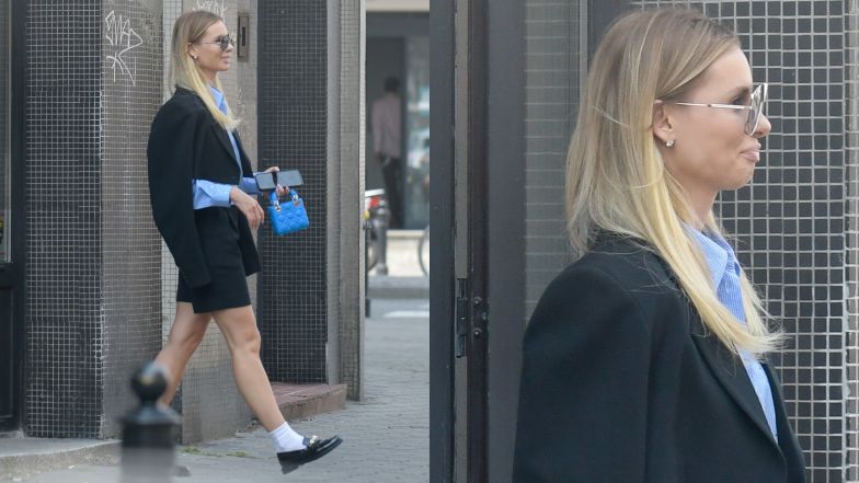 Izabela Janachowska pozuje przed butikiem Łukasza Jemioła