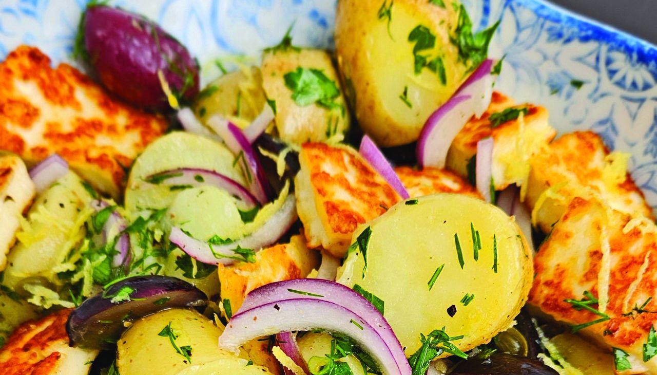 Greek salad with potatoes and halloumi. The best one you can make