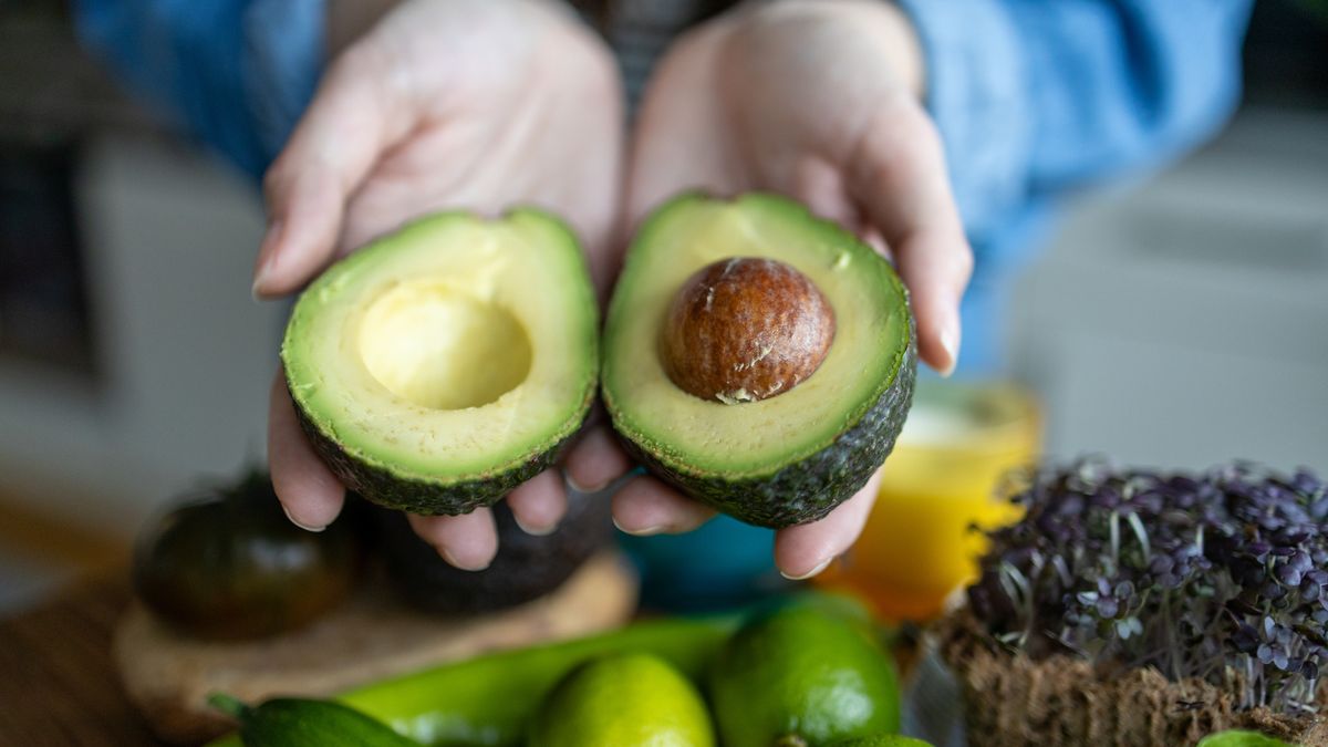 Close up of an avocado in woman's hands. Holding open avocado
Avocado is a superfood. Nutrient rich world of superfoods. Trending Foods - Superfoods. Incorporation of superfoods into everyday meals. Superfoods have colorful and wholesome nature, they emphasizing their role in promoting health and wellness. Preparation of avocado salat, guacamole.
Kate Wieser