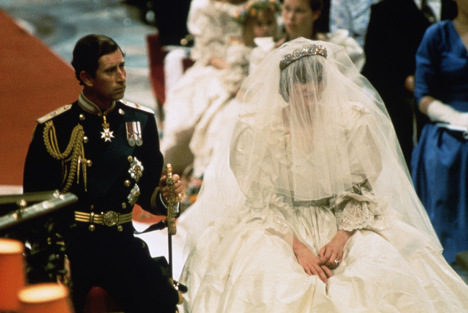 Wedding of Prince Charles and Lady Diana7/29/1981-London, England-ORIGINAL CAPTION READS: Photo of Prince Charles and Lady Diana Spencer, shown seated during their wedding ceremony.  BPA2# 6056BettmannEnglish:CB2, two people:CB2, prominent persons:CB2, Caucasian ethnicity:CB2, groom:CB3, prince:CB3, government:CB2, male:CB2, couples:CB2, female:CB2, Royal wedding of Prince Charles and Diana Spencer:CB2, wedding dress:CB3, bride:CB3, lady:CB3, Princess Diana:CB3, Charles, Prince of Wales:CB2