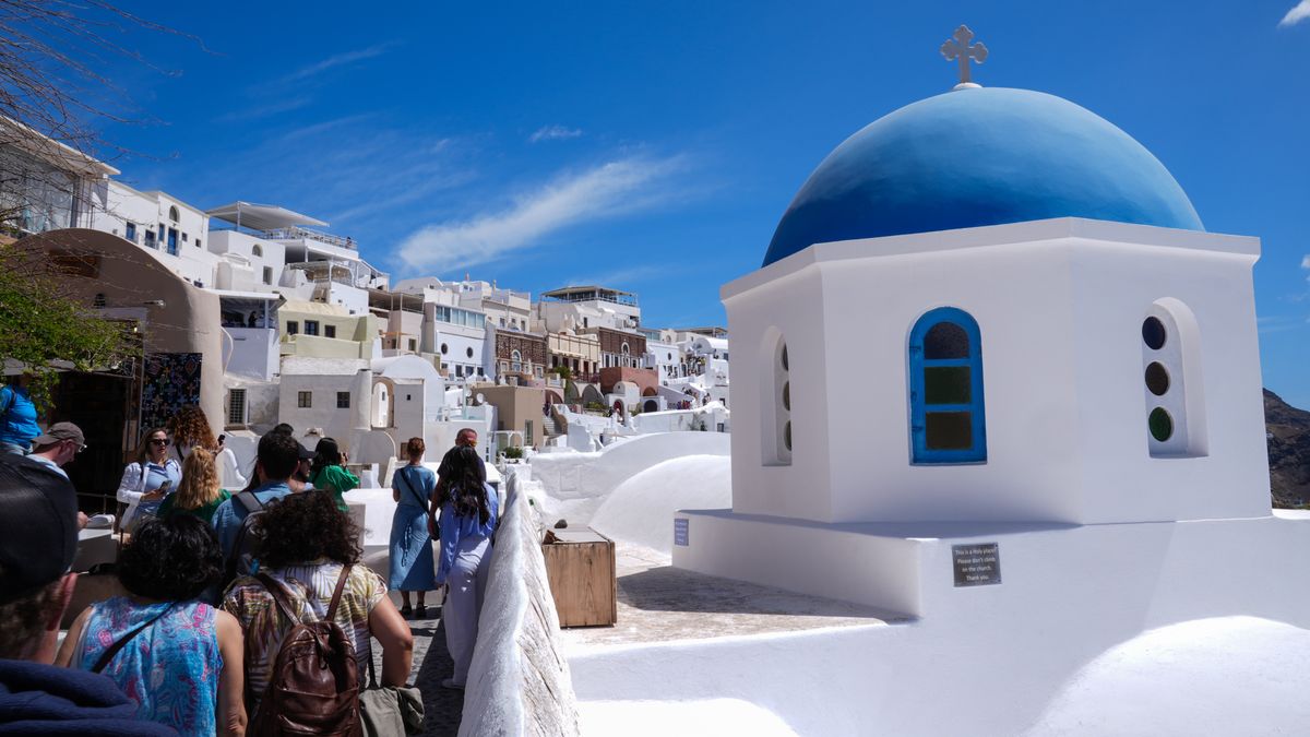 SANTORINI, GREECE - MAY 9: A general view from Santorini Island, one of the most famous islands in the world with its traditional architecture, houses made of stones unique to the region, in Santorini, Greece on May 9, 2024. The island, which attracts attention with its settlement built on the cliffs, can be reached by cable car or by climbing a 657-step stairway after travelling by sea. (Photo by Mehmet Emin Menguarslan/Anadolu via Getty Images)