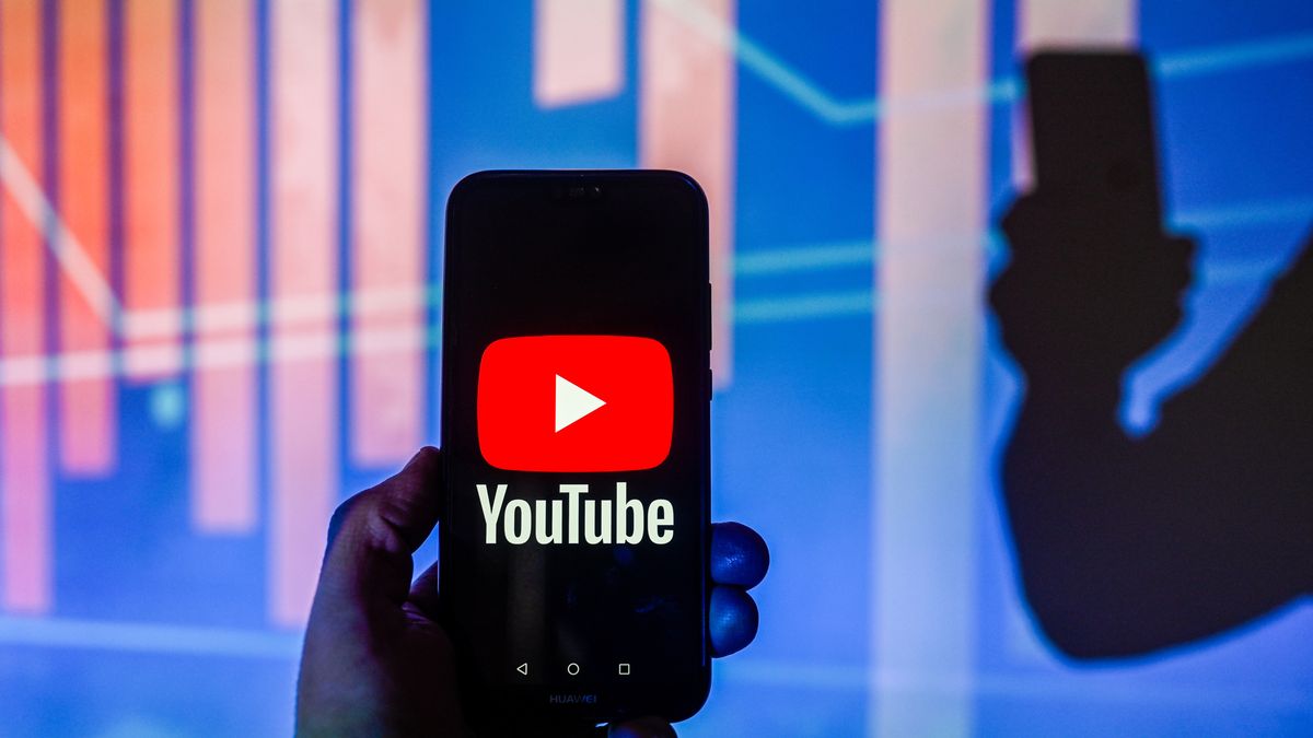 POLAND - 2024/01/17: In this photo illustration, a Youtube logo is displayed on a smartphone with bar graph in the background. (Photo Illustration by Omar Marques/SOPA Images/LightRocket via Getty Images)