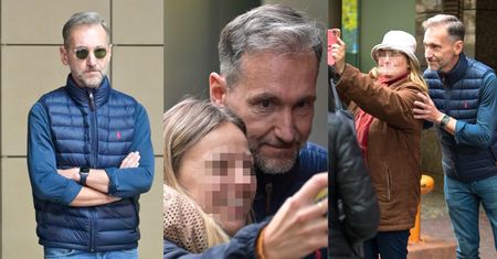 Posępny Piotr Kraśko robi sobie zdjęcia z FANAMI przed studiem "Dzień Dobry TVN" (ZDJĘCIA)