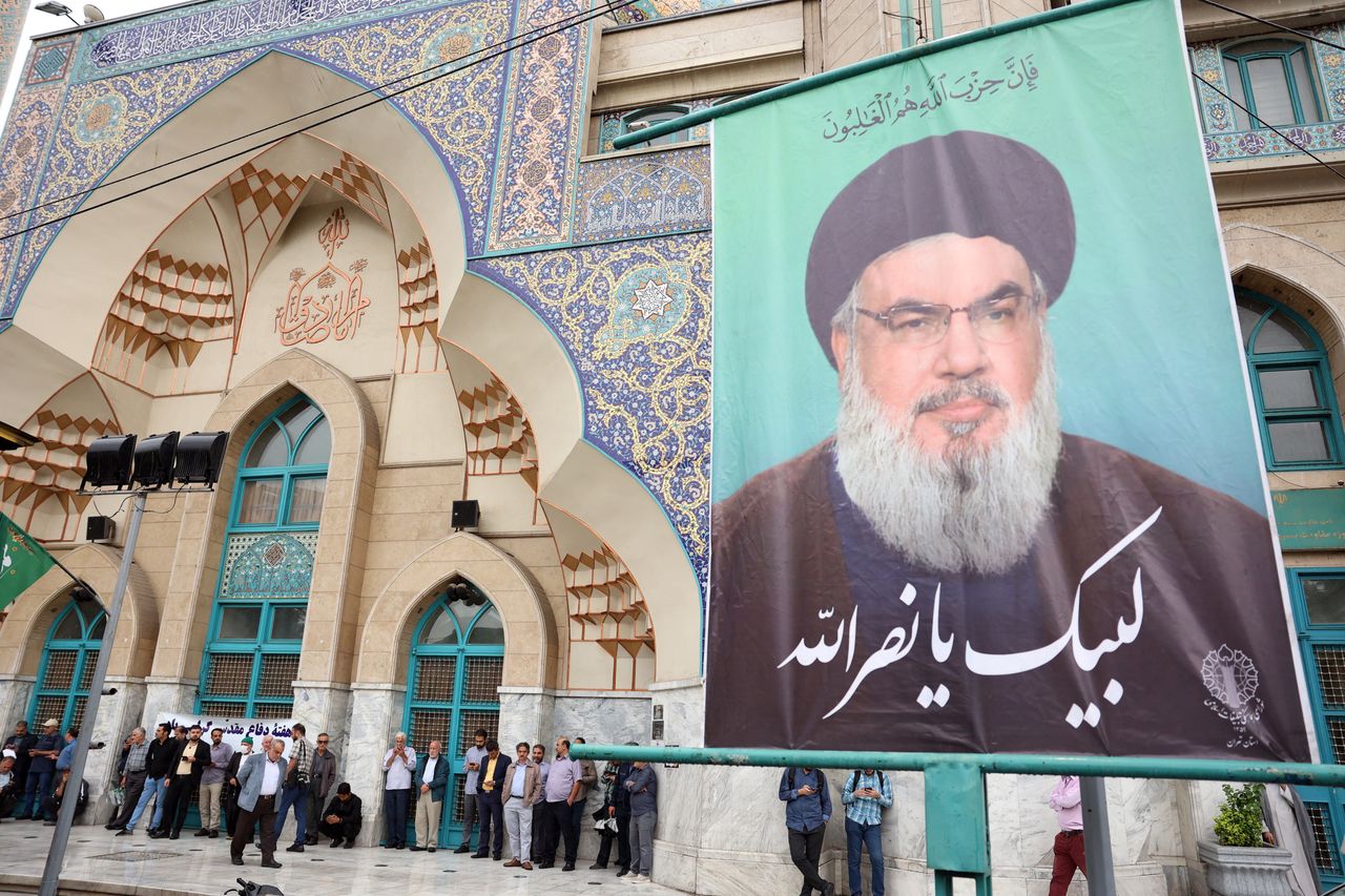 
A banner with the image of Hasan Nasrallah