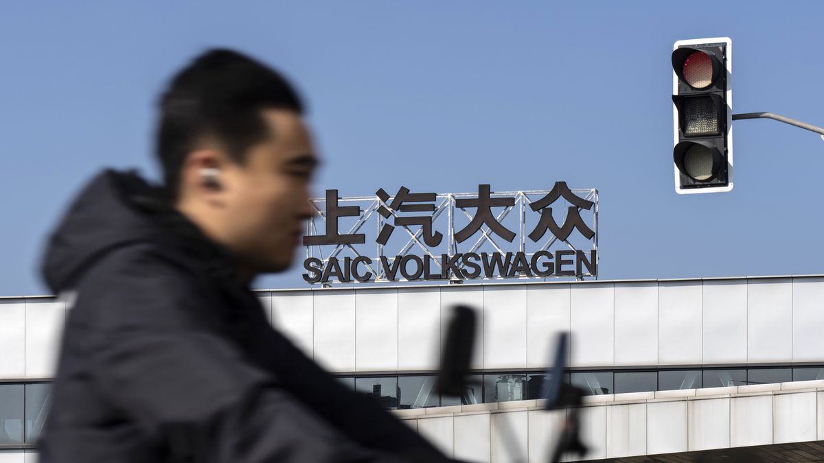 Signage at the Volkswagen AG Modular Electric Drive Matrix (MEB) factory, operated with local partner SAIC Motor Corp., in Shanghai, China, on Thursday, Oct. 24, 2024. Volkswagen is scheduled to release earnings results on Oct. 30. Photographer: Qilai Shen/Bloomberg via Getty Images