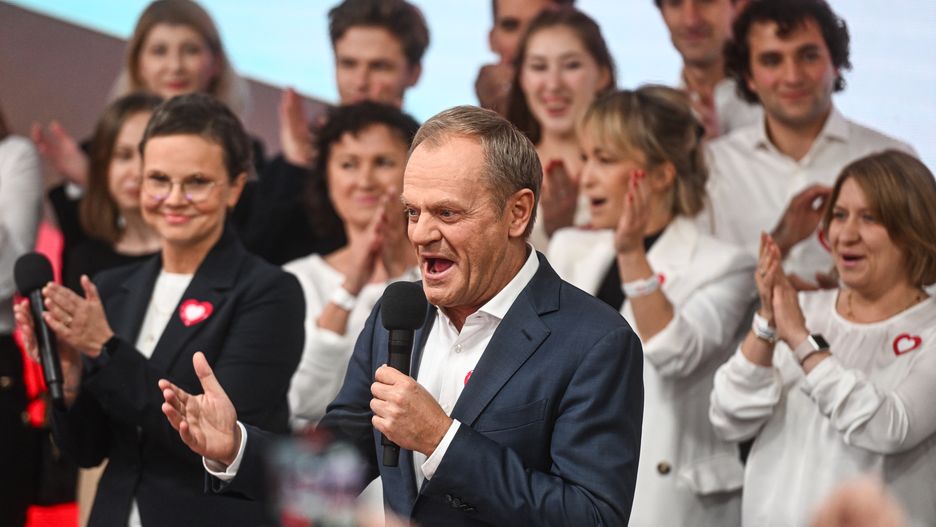 WARSAW, POLAND - OCTOBER 15: The leader of Civic Coalition (KO), Donald Tusk celebrates the exit poll results during Poland's Parliamentary elections on October 15, 2023 in Warsaw, Poland. Poles are voting today to decide whether the ruling national conservative Law and Justice party (PiS), led by Jaroslaw Kaczynski, will govern for a third consecutive term, or whether a coalition of center-left, pro-European parties will be given the opportunity to form a government. Also on the ballot is a referendum introduced by the current government over EU migration reform. (Photo by Omar Marques/Getty Images)