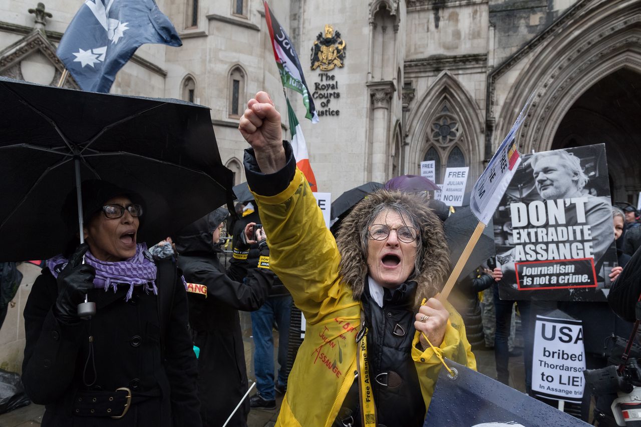 LONDON, UNITED KINGDOM - FEBRUARY 21: Supporters of Julian Assange demonstrate outside the Royal Courts of Justice on the second day of Assange's final appeal hearing at the High Court against the US's extradition order in London, United Kingdom on February 21, 2024. Julian Assange, the founder of WikiLeaks, could face a sentence of 175 years in prison on charges under the US Espionage Act for soliciting, gathering and publishing secret US military documents. (Photo by Wiktor Szymanowicz/Anadolu via Getty Images)