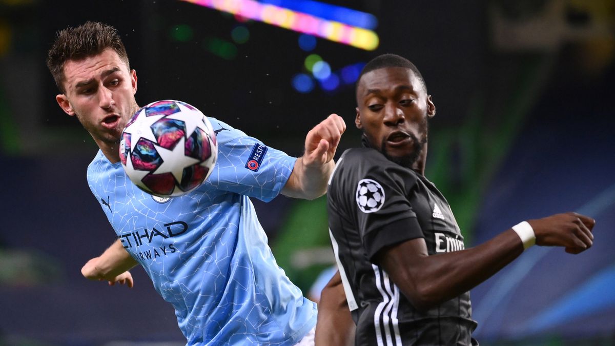 PAP/EPA / Franck Fife / Na zdjęciu: Aymeric Laporte (z lewej) oraz Karl Toko Ekambi