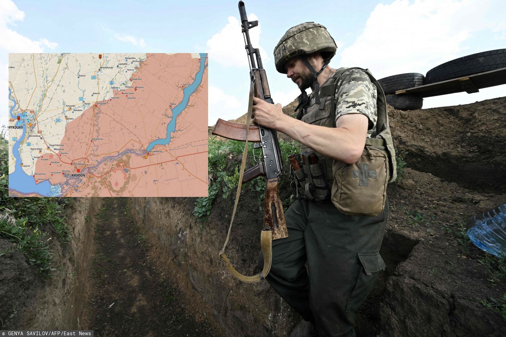 A Ukrainian serviceman Petro, 32, walks in a trench 