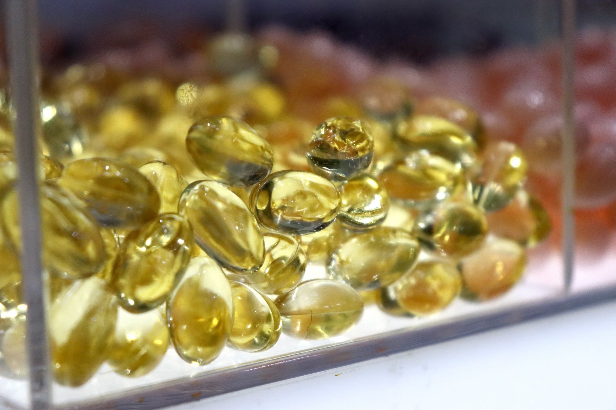 Close-up of fish oil capsules.
Close-up of fish oil capsules.
Rapeepong Puttakumwong