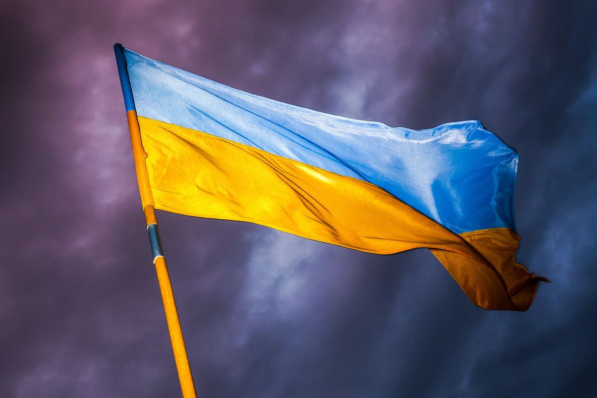 Ukrainian flag is seen during a demonstration of solidarity with Ukraine at the Main Square in  Krakow, Poland on July 10, 2022. (Photo by Beata Zawrzel/NurPhoto via Getty Images)