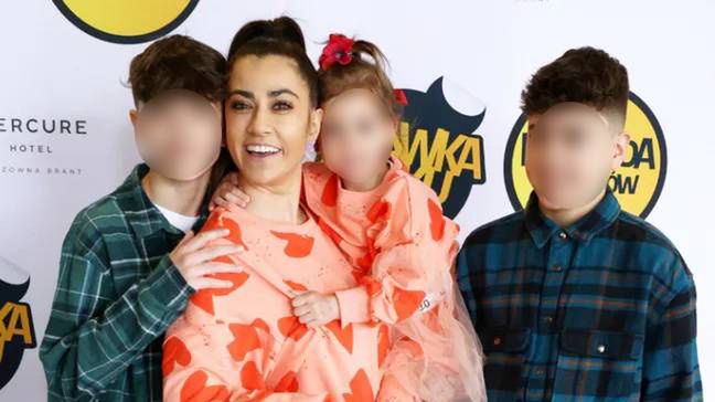 Maja Hyży z synami na ściance