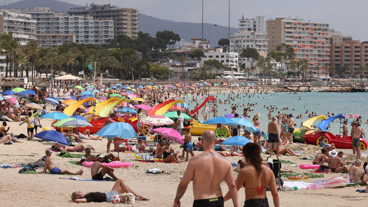 Tourists on the beach in Magaluf, Spain, on Sunday, July 21, 2024. In the Spanish destinations of Mallorca and the Canary Islands, locals have been protesting to reclaim space from visitors. Photographer: Andrey Rudakov/Bloomberg via Getty Images