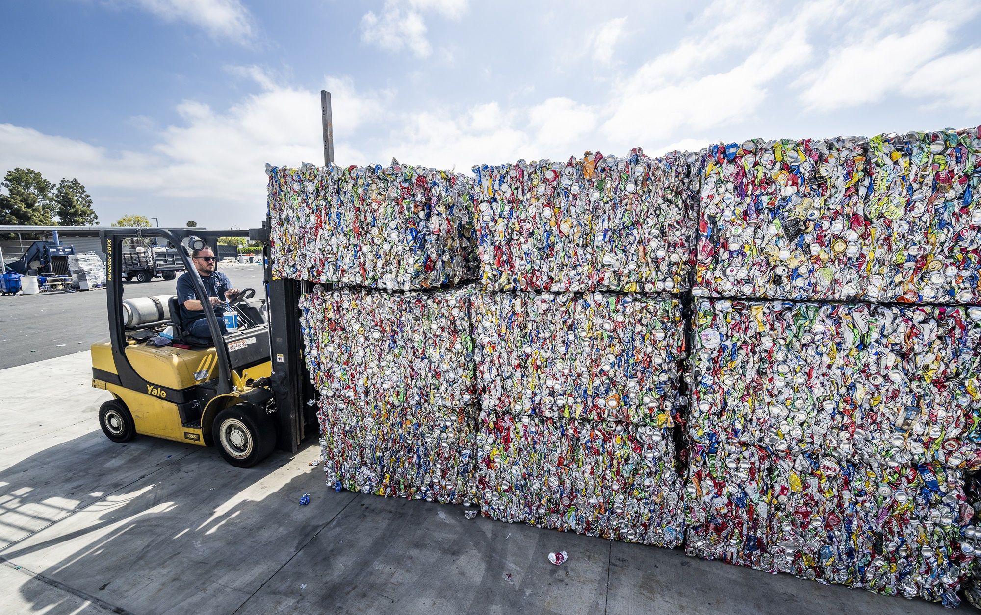 Recycling in California
COSTA MESA, CA - July 14: A recycling technician loads an 800 pound block of compressed aluminum cans at OCC Recycling Center in Costa Mesa, CA on Thursday, July 14, 2022. Experts say Californias 35-year-old recycling system has been falling apart and leading to a drop in recycling rates in recent years. (Photo by Paul Bersebach/MediaNews Group/Orange County Register via Getty Images)
MediaNews Group/Orange County Re