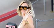 Frywolna Khloe Kardashian mknie na spotkanie w niebezpiecznie wyciętym kombinezonie, omal nie uwalniając piersi przed paparazzi (ZDJĘCIA)