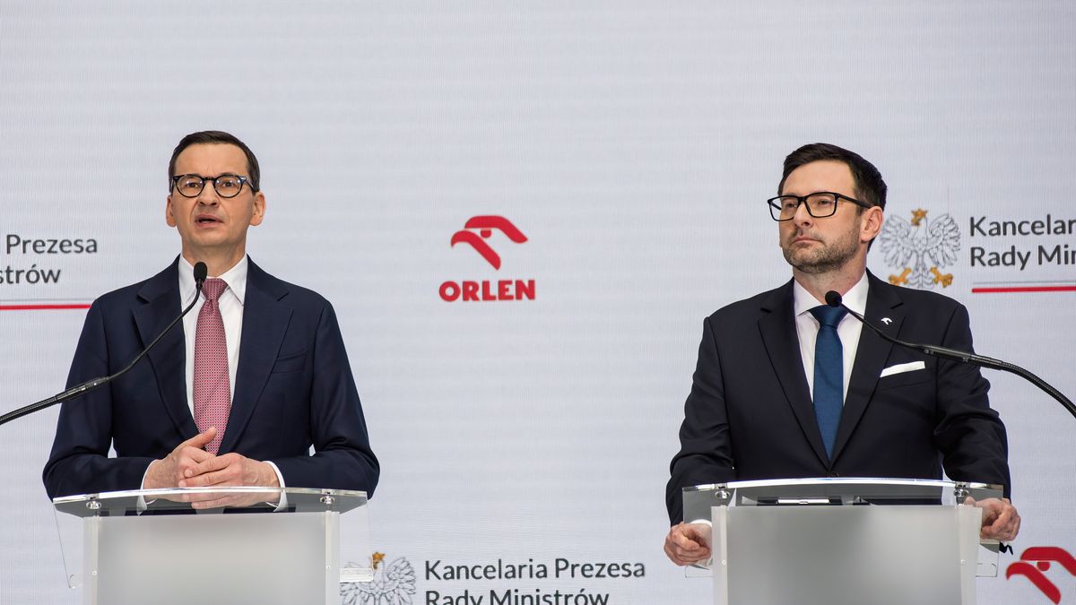 WARSAW, POLAND - 2023/04/17: Prime Minister Mateusz Morawiecki (L) and Daniel Obajtek (R), the President and CEO of the Polish Oil Company ORLEN speak at the press conference in Warsaw. Daniel Obajtek, the President and CEO of the Polish Oil Company ORLEN, announced the details of the planned investments in Small Modular Reactors (SMR) for Poland. For this purpose, the company Orlen Synthos Green Energy (OSGE) was established, supported by the Polish billionaire - Michal Solowow. OSGE will buy reactors from US-based GE Hitachi. (Photo by Attila Husejnow/SOPA Images/LightRocket via Getty Images)
