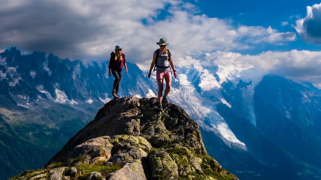 Two young female hikers walking on a rock near La Flégère
CHAMONIX, HAUTE-SAVOIE, FRANCE - 2022/07/13: Two young female hikers walking on a rock near La Flégère, the Mont Blanc massif partially covered in clouds in the distance (Model Released). (Photo by Frank Bienewald/LightRocket via Getty Images)
Frank Bienewald
2, cloud, clouds, flegere, la flégère, montblanc, monte bianco, mountains, mt. blanc, outdoor, outside, person, rocks, scene, scenery, scenic, summit, tourists, woman, young, alpine, alps, beautiful, exterior, female, french, girl, hiker, massif, mountainscape, range, rock, summits