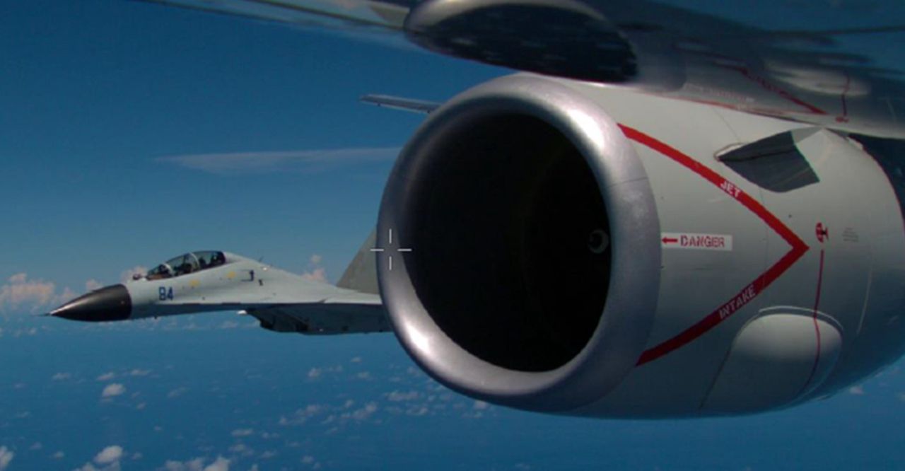 Chinese fighter next to an American machine