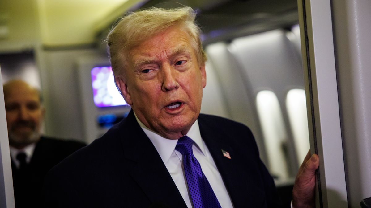 IN FLIGHT - FEBRUARY 06: U.S. President Donald Trump gaggles with reporters while aboard Air Force One on February 6, 2026 en route to Palm Beach, Florida. The President is spending the weekend at Mar-a-Lago, his private club. (Photo by Samuel Corum/Getty Images)