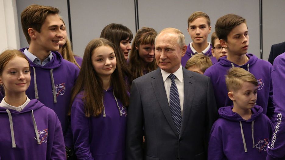 Russian President Vladimir Putin visits the Kalashnikov Academy in IzvevskIZVEVSK, RUSSIA - SEPTEMBER 19: (RUSSIA OUT) Russian President Vladimir Putin poses for a photo with children while visiting the Kalashnikov Academy on September 19, 2019 in Izhevsk, Russia. Putin is on a one-day visit to Izhevsk, 967 km east of Moscow, to host the Military-Industrial Commission Meeting. (Photo by Mikhail Svetlov/Getty Images)Mikhail Svetlov