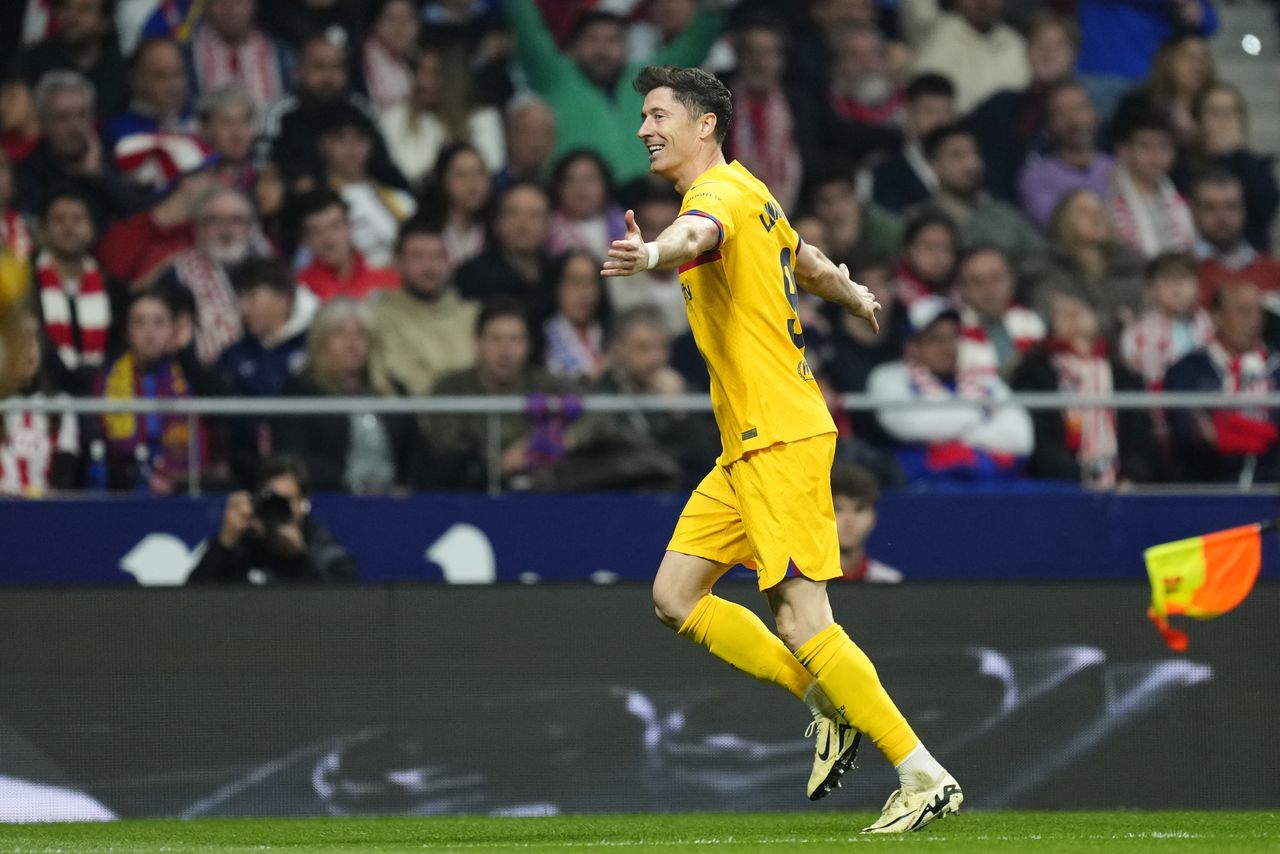 Robert Lewandowski centre-forward of Barcelona and Poland celebrates after scoring his sides first goal during the LaLiga EA Sports match between Atletico Madrid and FC Barcelona at Civitas Metropolitano Stadium on March 17, 2024 in Madrid, Spain. (Photo by Jose Breton/Pics Action/NurPhoto via Getty Images)