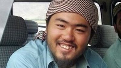 Maszyna sprawdza czy japońscy robotnicy są wystarczająco szeroko uśmiechnięci 1