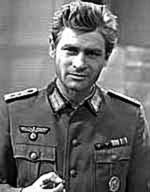 Stanisław Mikulski w roli Hansa Klossa