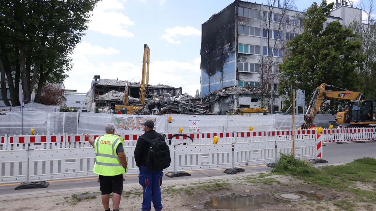 BERLIN, GERMANY - JUNE 24: Workers stand outside the demolition site of a portion of the Diehl Metal Applications manufacturing facility following a fire that gutted the building on June 24, 2024 in Berlin, Germany. Investigators categorized the May 3 fire as a technical accident, though recent media reports cite western intelligence sources as being convinced that Russia was behind the fire. Diehl is a major German defence contractor whose product line includes the Iris-T air defence system, several of which Germany has donated to Ukraine. The company claims the Berlin facility only manufactures products for the auto industry. (Photo by Sean Gallup/Getty Images)