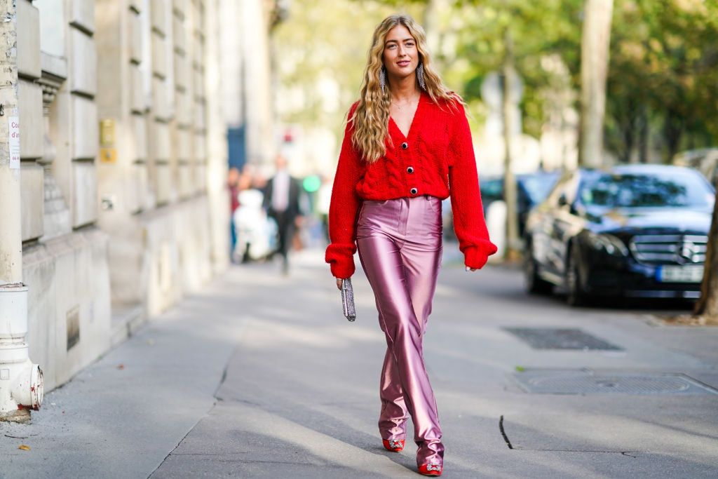 Street Style : Paris Fashion Week - Womenswear Spring Summer 2020PARIS, FRANCE - SEPTEMBER 27: Emili Sindlev wears earrings, a red wool V-neck top, lustrous pink full-length pants, red heels with a bejeweled buckle, a glittering bejeweled clutch , outside Alessandra Rich, during Paris Fashion Week - Womenswear Spring Summer 2020 on September 27, 2019 in Paris, France. (Photo by Edward Berthelot/Getty Images)Edward Berthelotbestof, topix