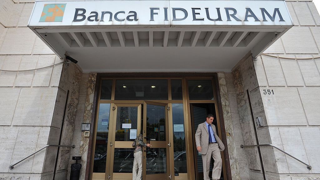 Banca Fideuram Headquarters And Branches
A visitor leaves the Banca Fideuram SpA headquarters in Rome, Italy, on Tuesday, June 22, 2010. Intesa Sanpaolo SpA, Italy's second-biggest bank, postponed an initial public offering of its Banca Fideuram SpA asset-management unit because of "unfavorable" market conditions. Photographer: Victor Sokolowicz/Bloomberg via Getty Images
Bloomberg
BANK, BANKING, EMEA, EUROPE, EUROPEAN, FINANCE, OFFICE
