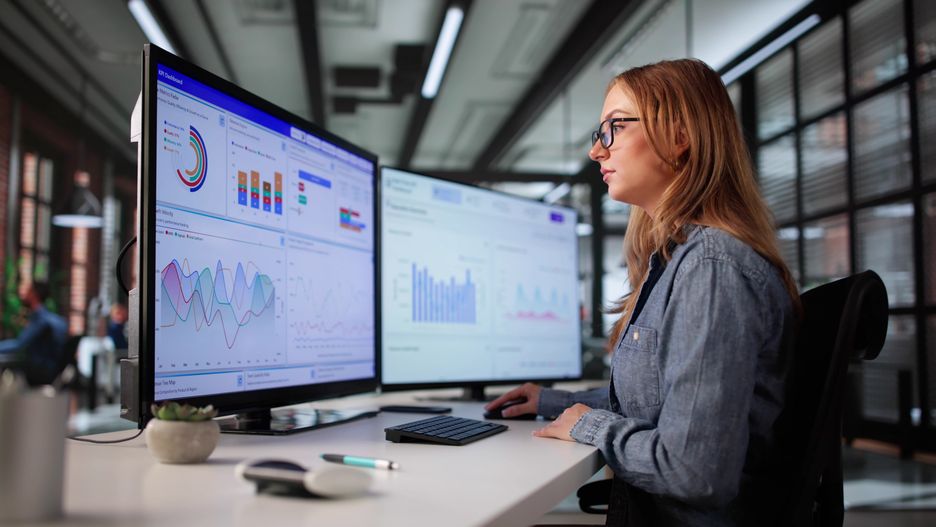Young Woman Analyzing Financial Data On Computer In Office Setting.dashboard, data, computer, woman, business, financial, monitor, office, girl, female, desktop, analyst, young, analytics, screen, market, kpi, tracking, analysis, entrepreneurship, scientist, using, charts, diversity, chart, manager, performance, marketing, statistic, women, multiple, table, growth, technology, lady, pc, decision, caucasian, dashboard, data, computer, woman, business, financial, monitor, office, girl, female, desktop, analyst, young, analytics, screen, market, kpi, tracking, analysis, entrepreneurship, scientist, using, charts, diversity, chart, manager, performance, marketing, statistic, women, multiple, table, growth, technology, lady, pc, decision, caucasian