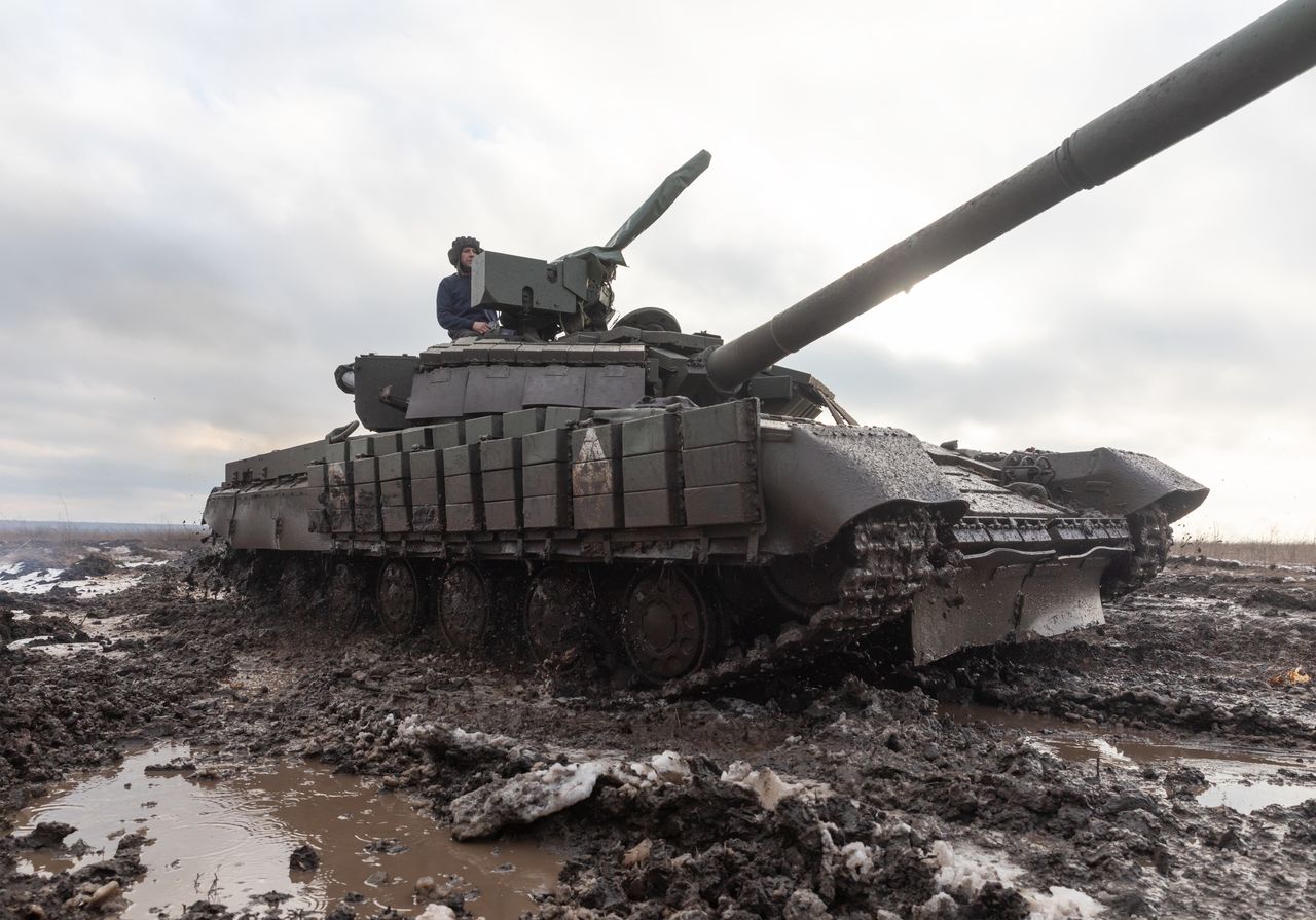 KHARKIV REGION, UKRAINE - 2023/12/20: A tank is seen in the roadless area going on a combat mission. Tank battalion of the 41st Mechanized Brigade of the Armed Forces of Ukraine in Kharkiv region, Ukraine. The war of the Russian Federation against Ukraine has been going on for 2 years now. Ukrainian troops are courageously defending their country. (Photo by Mykhaylo Palinchak/SOPA Images/LightRocket via Getty Images)