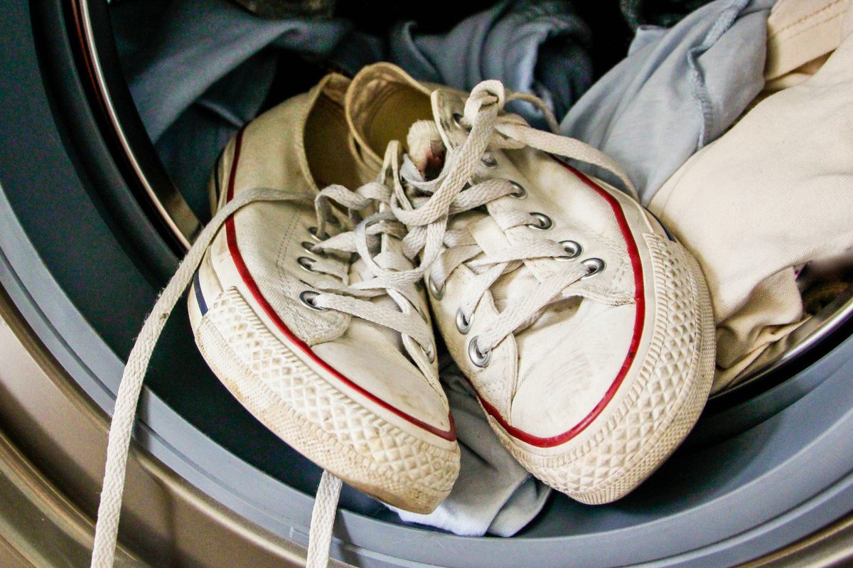 White sneakers in the washing machine